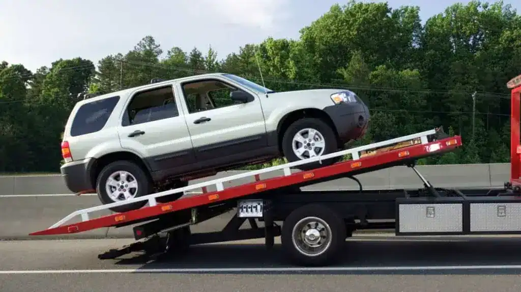 A car loaded on SMC truck for towing service