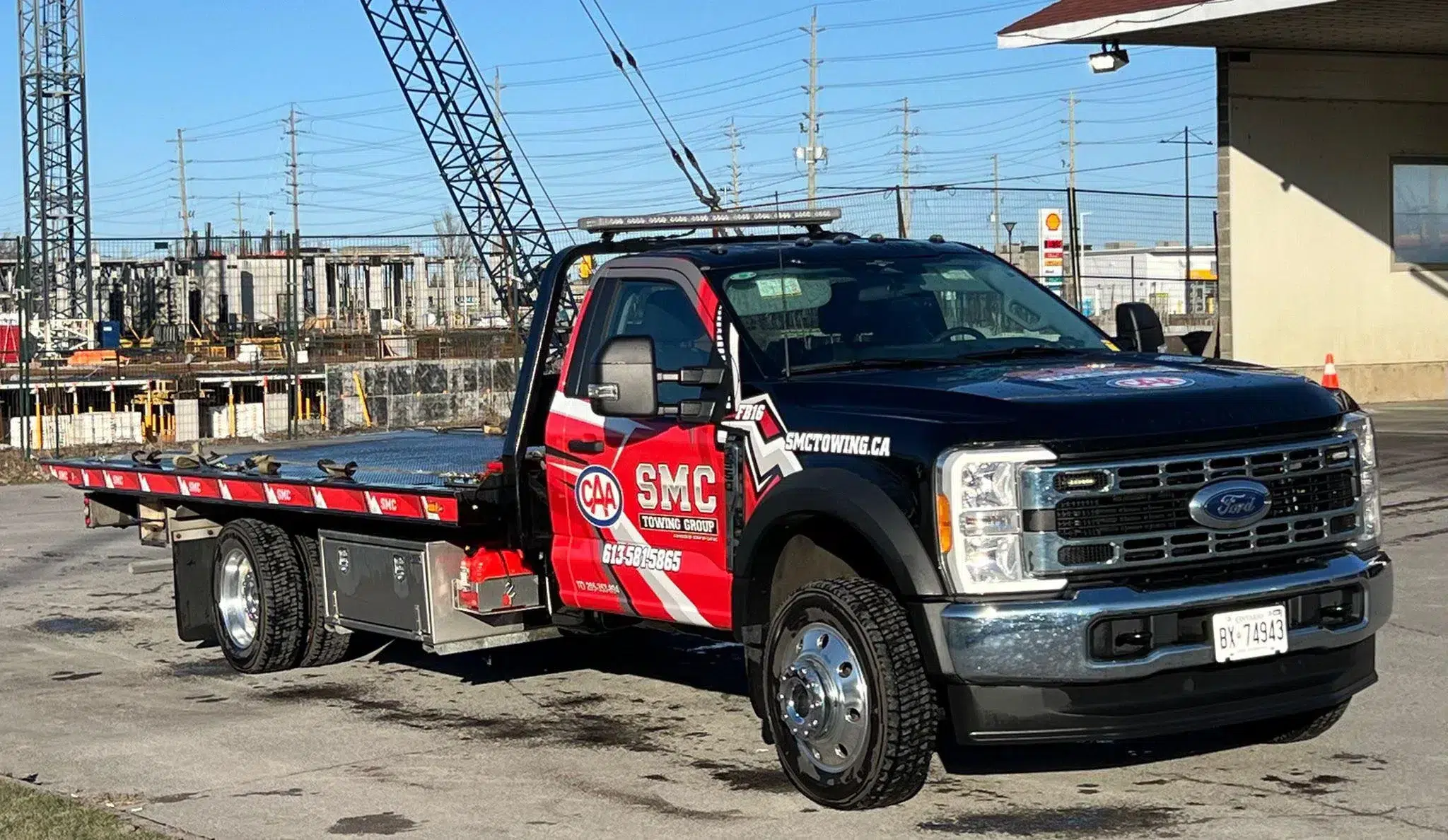 Reliable tow truck dispatch service by SMC Towing Group across Vanier Montreal Road and Central East Ottawa